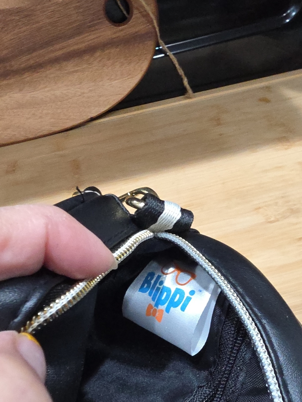 Kids Black Round Crossbody Bag with Playful Cartoon Skaters - Picture 3 of 4